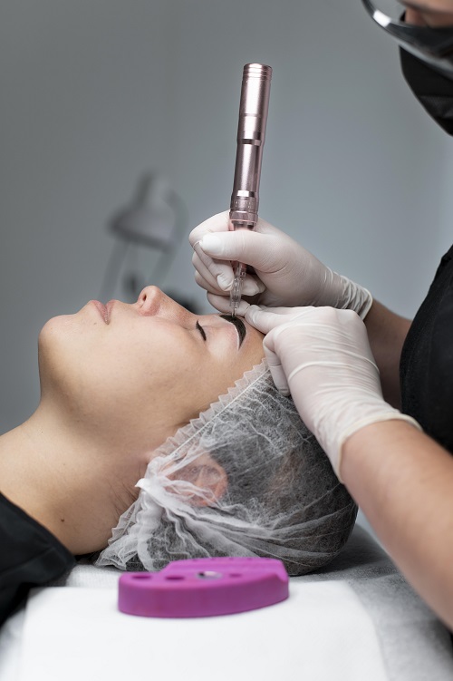 young-woman-going-through-microblading-treatment.jpg